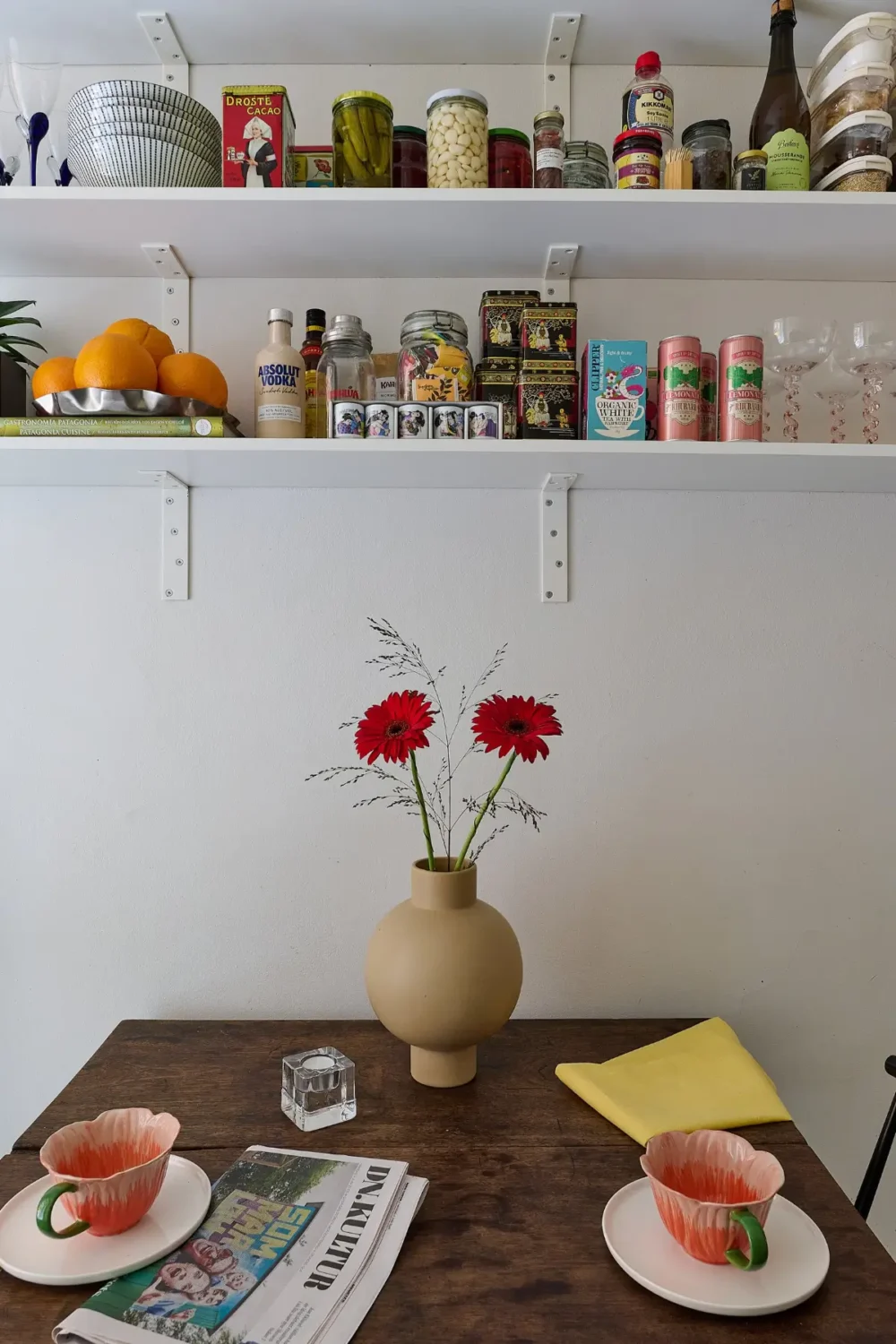A Colorful Stockholm Apartment with a Large Terrace 12 kitchen table with shelves