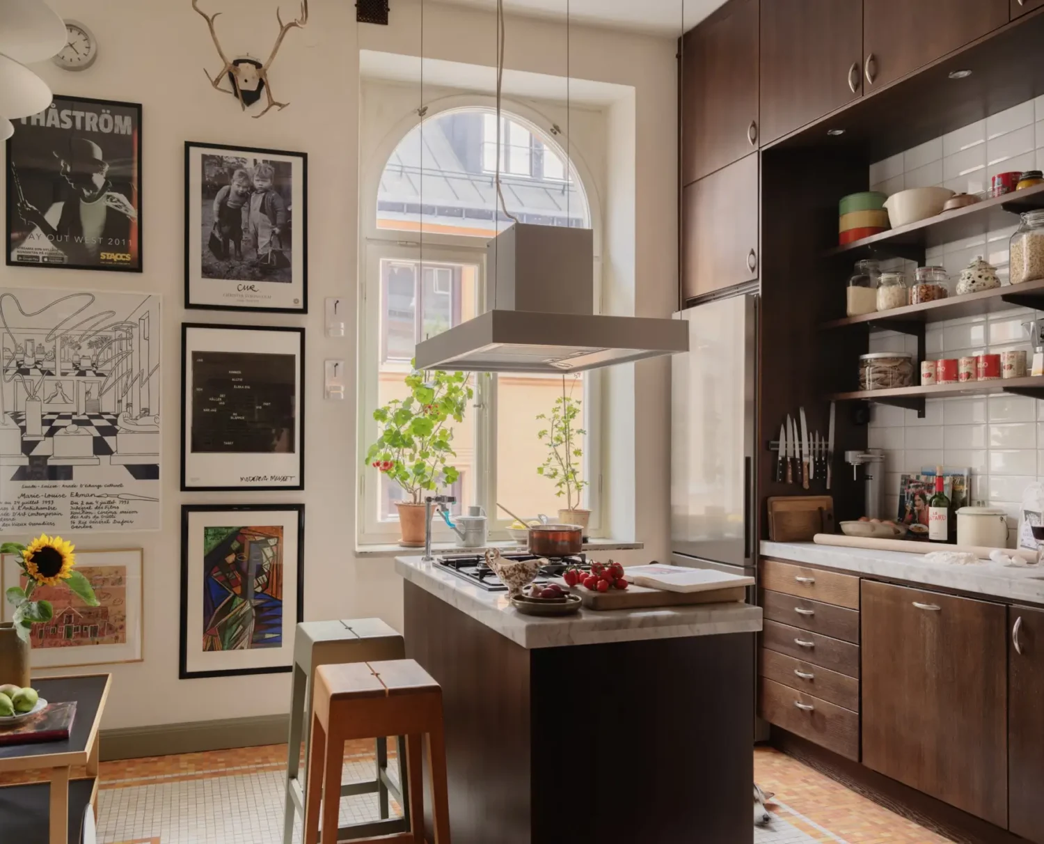 A Classic Late 19th Century Apartment with Magnificent Views of Stockholm 18 kitchen with island marble top white backsplash tiles