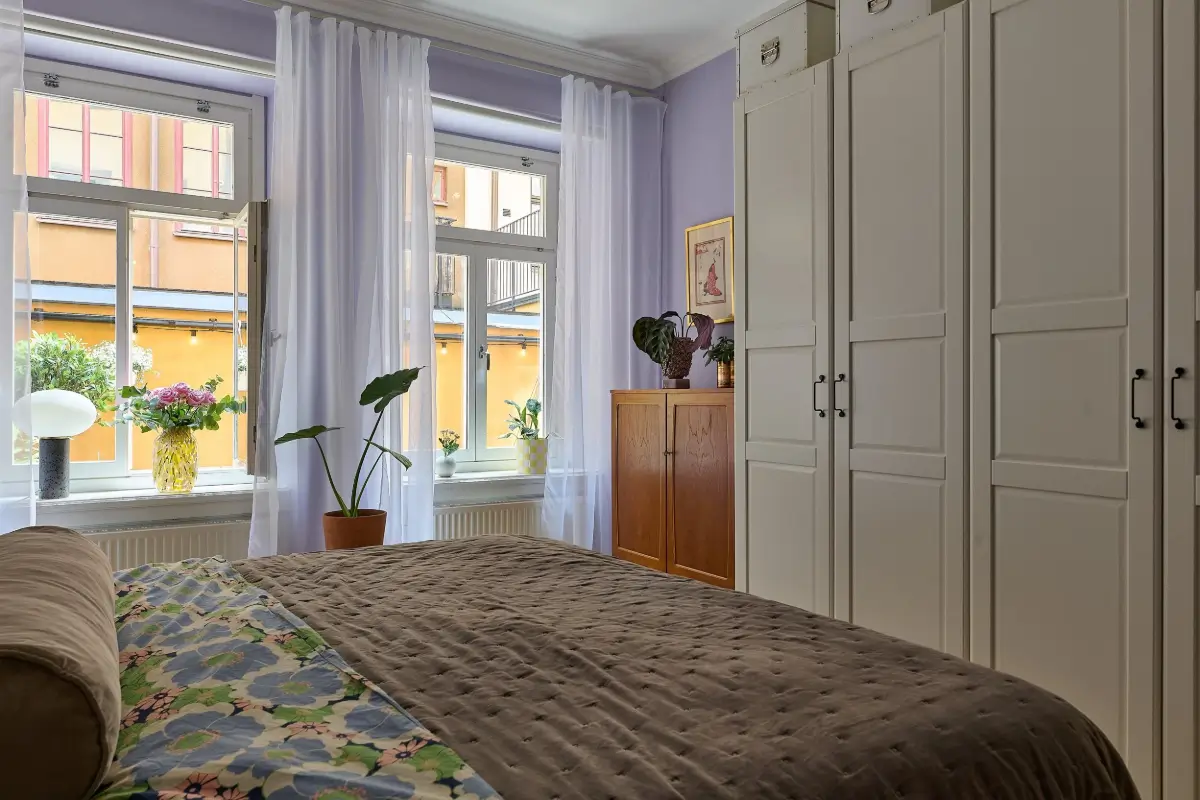 A Colorful Stockholm Apartment with a Large Terrace 15 lavender bedroom wardrobes