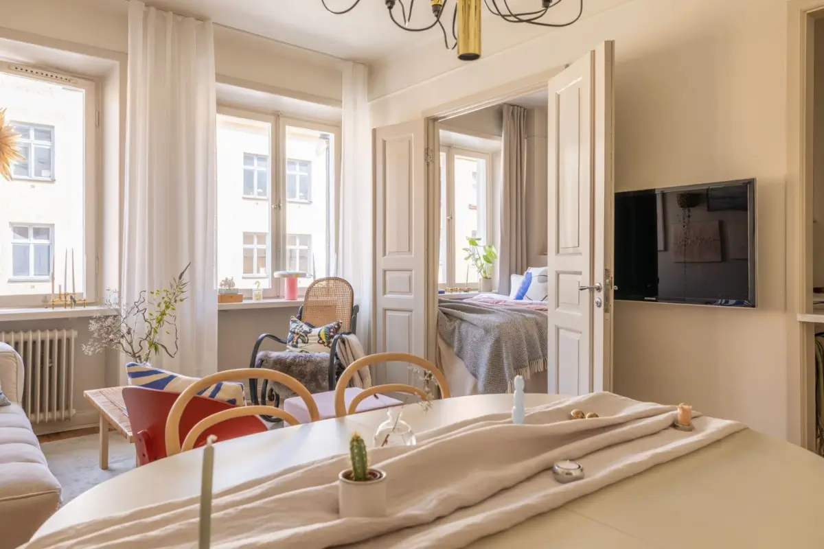 A Small Beige Stockholm Apartment with Plenty of Storage 8 light-colored living room