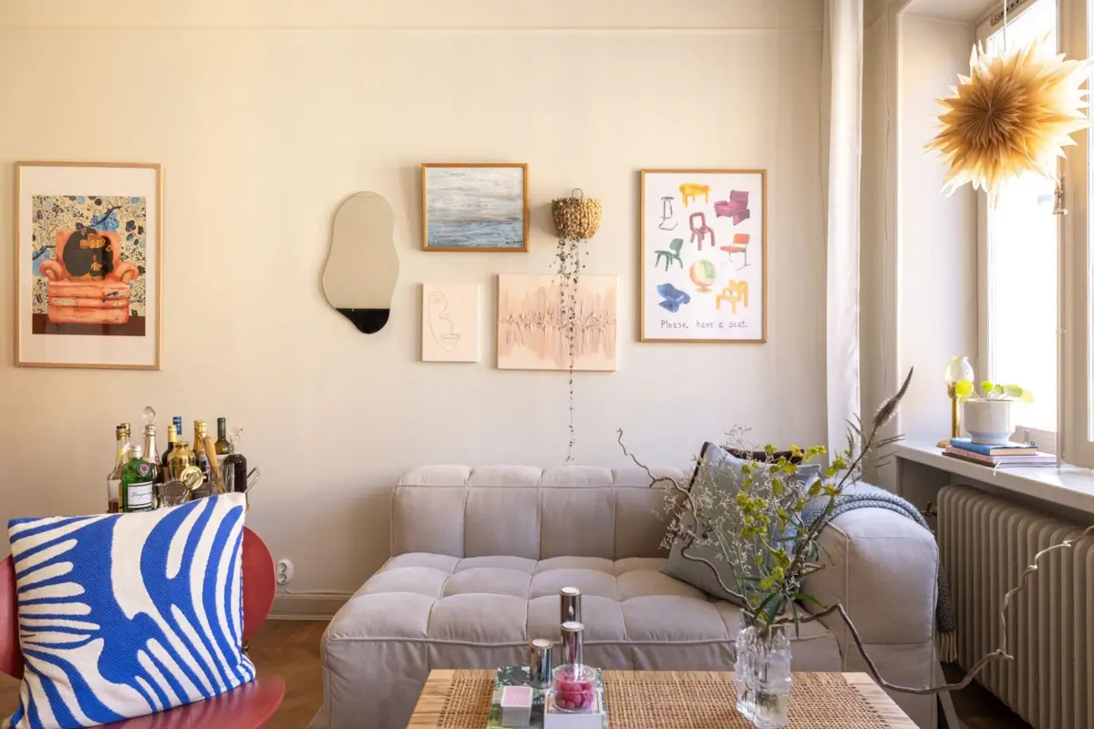 A Small Beige Stockholm Apartment with Plenty of Storage 3 light gray sofa