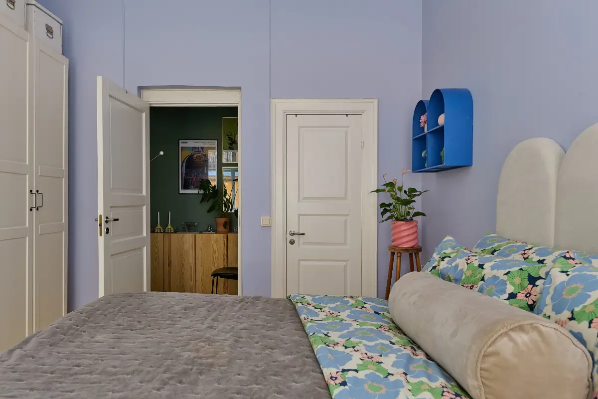 A Colorful Stockholm Apartment with a Large Terrace 19 lilac bedroom