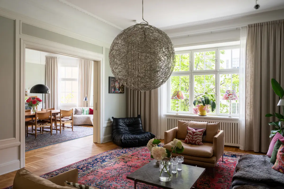 A Classic Stockholm Apartment with a Sky-Blue Kitchen 3 living and dining room in a row