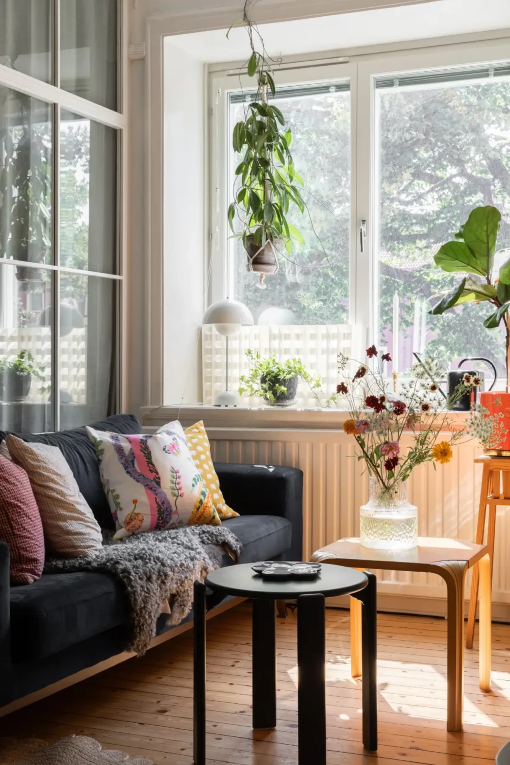 A Cozy Colorful Family Apartment with an Industrial Room Divider 4 living room detail