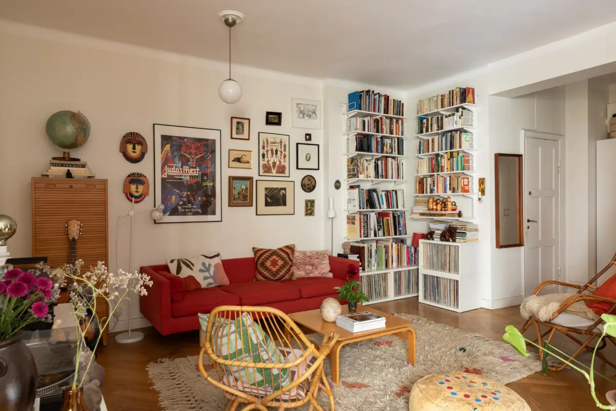 living room red sofa art bookshelves