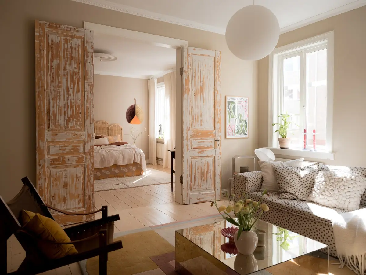 Neutral Shades and Period Elements in a Scandi Apartment 9 living room rustic wooden doors
