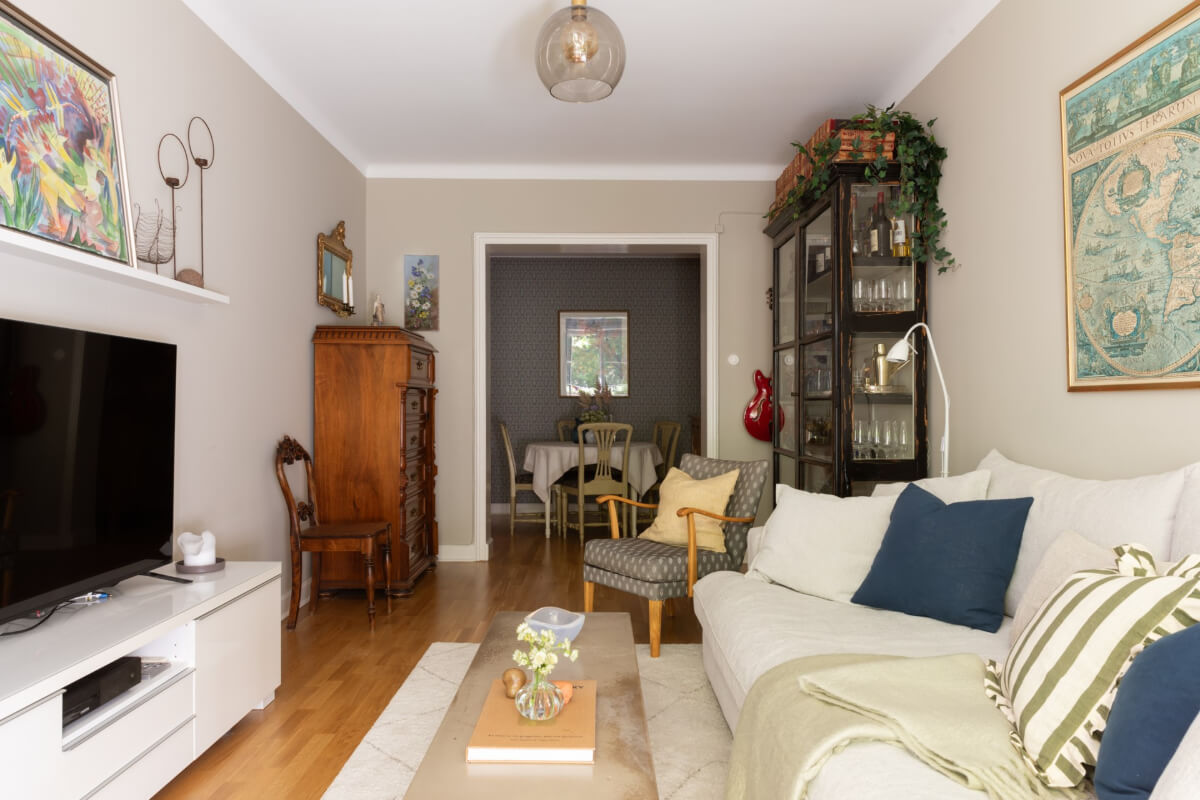 A 1930s Stockholm Apartment With Views of a Lush Garden 6 living room with dining area