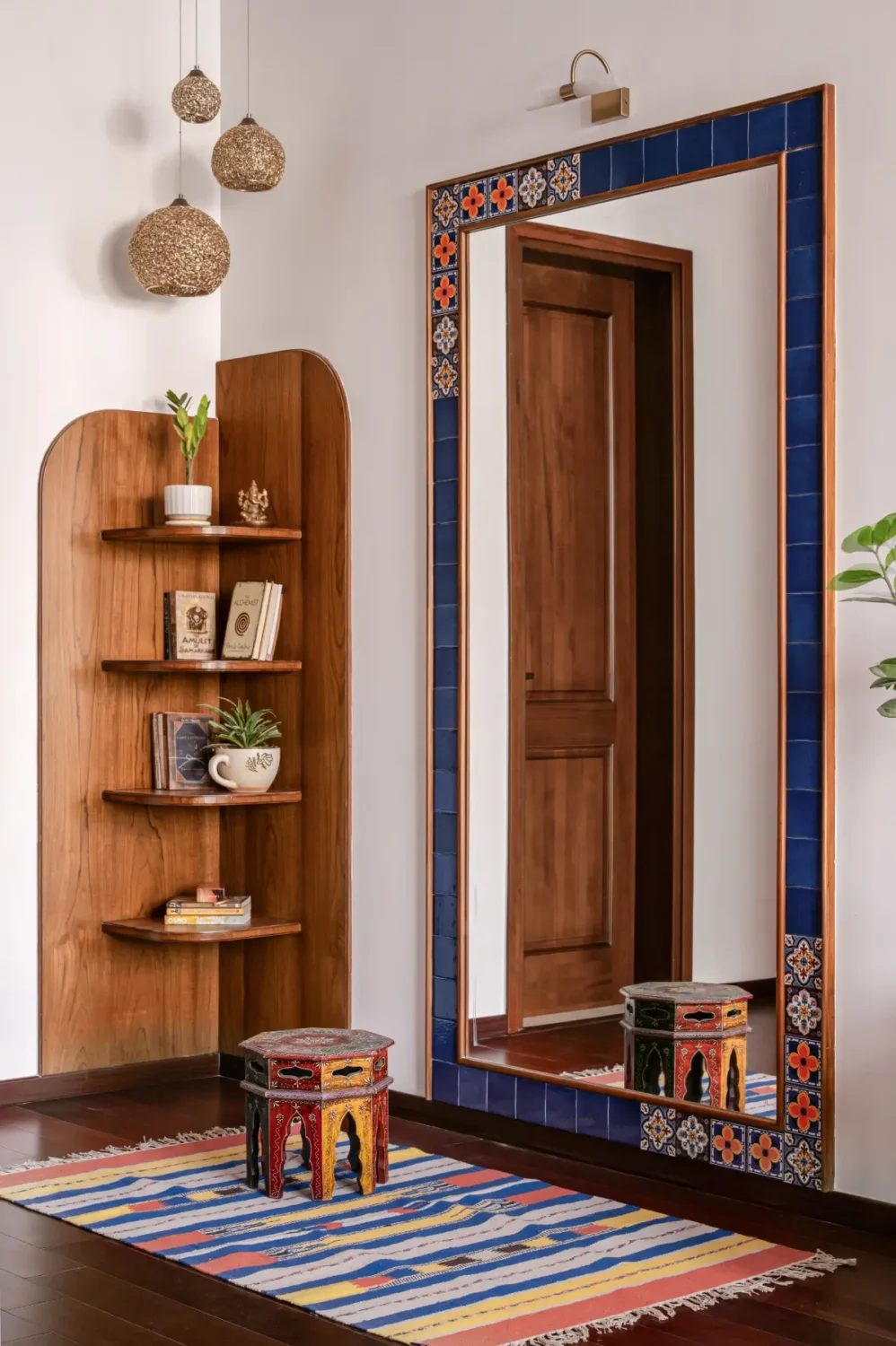 A South Indian Family Home Where Heritage Meets Bold Color Choices 22 mirror and shelves A South Indian Family Home Where Heritage Meets Bold Color Choices
