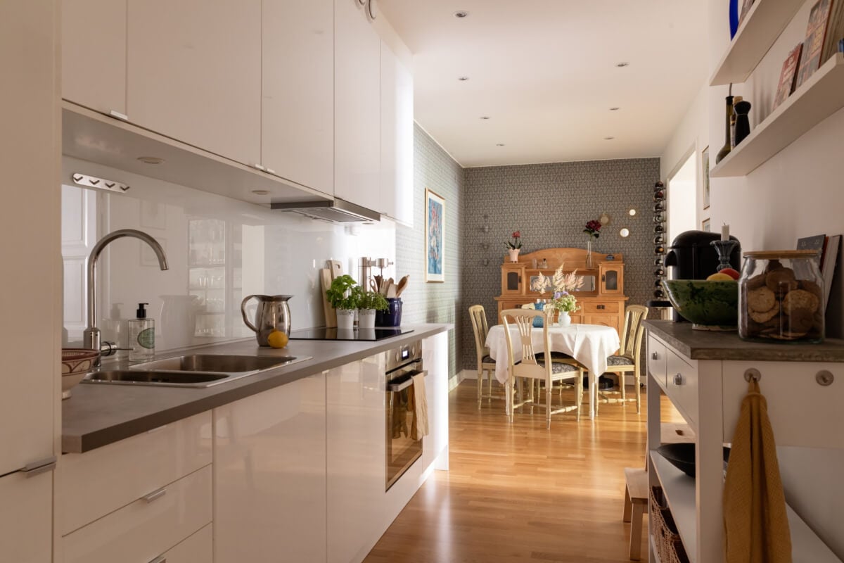 A 1930s Stockholm Apartment With Views of a Lush Garden 10 modern white kitchen