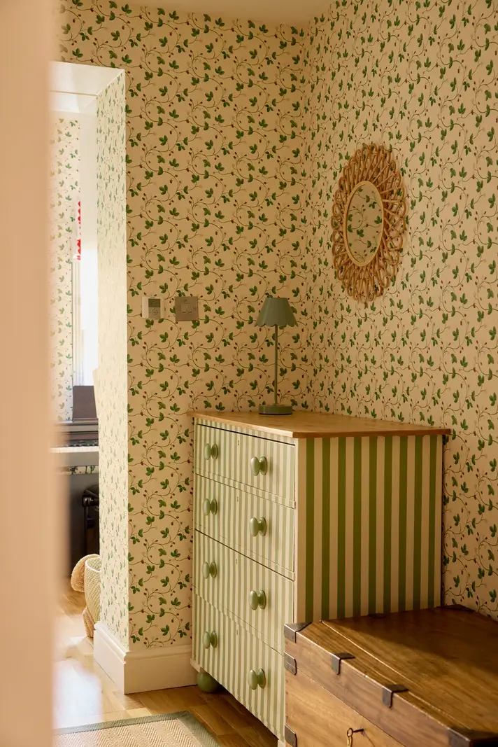 Pastel Hues in a Two-Bedroom Garden Apartment in West Kensington 14 nursery green striped dresser nordroom