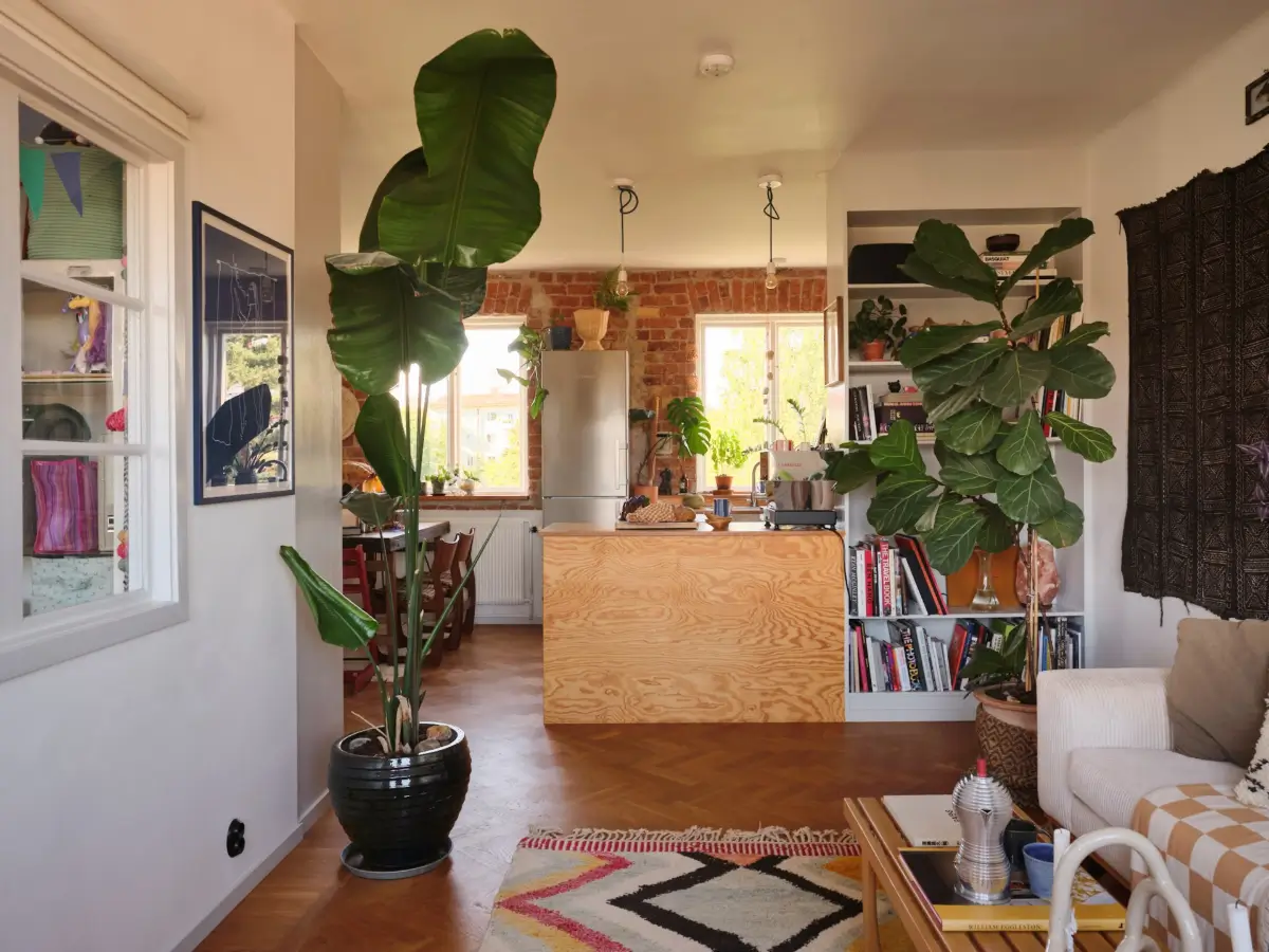 A Pink Bathroom and a Plywood Kitchen in a Stockholm Apartment 15 open plan living space herringbone parquet floor