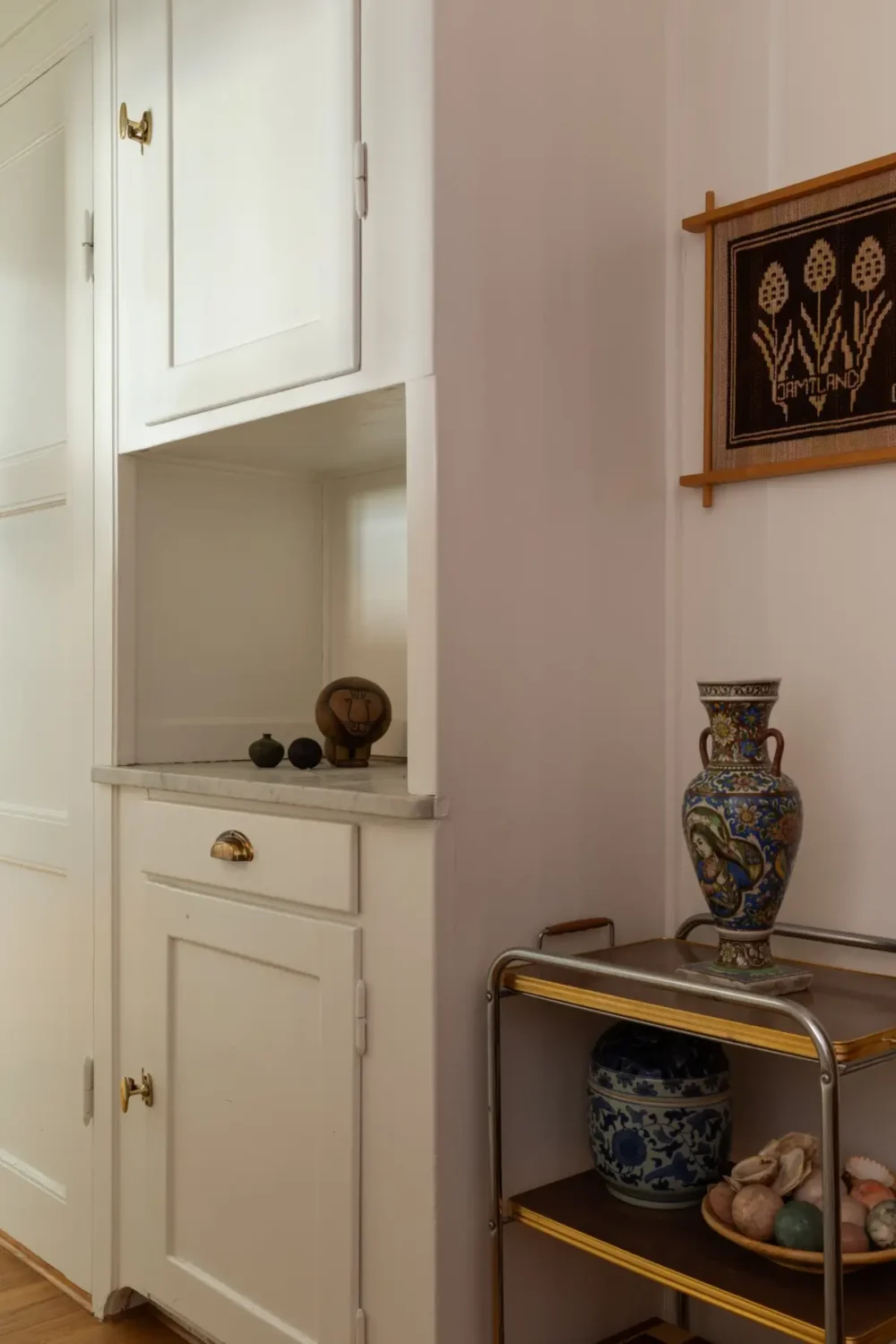 A Cozy 1920s Apartment Filled with Books, Art, and Music 16 original cabinet