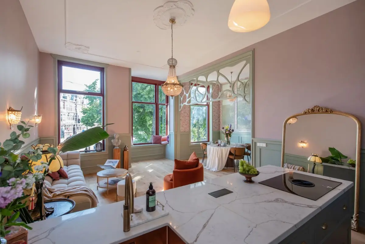 Art Nouveau Elegance Meets Modern Living in a Pink & Green Apartment 11 pastel colored open-plan living space large windows