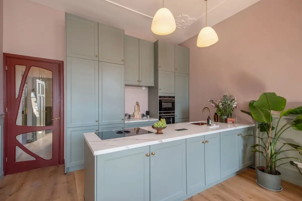 Art Nouveau Elegance Meets Modern Living in a Pink & Green Apartment 13 pastel green and pink kitchen