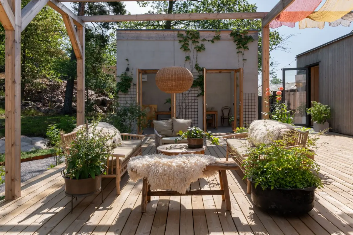 A Modern Wooden Cottage with Sea Views Close to Stockholm 33 pergola colorful fabric A Modern Wooden Cottage with Sea Views Close to Stockholm