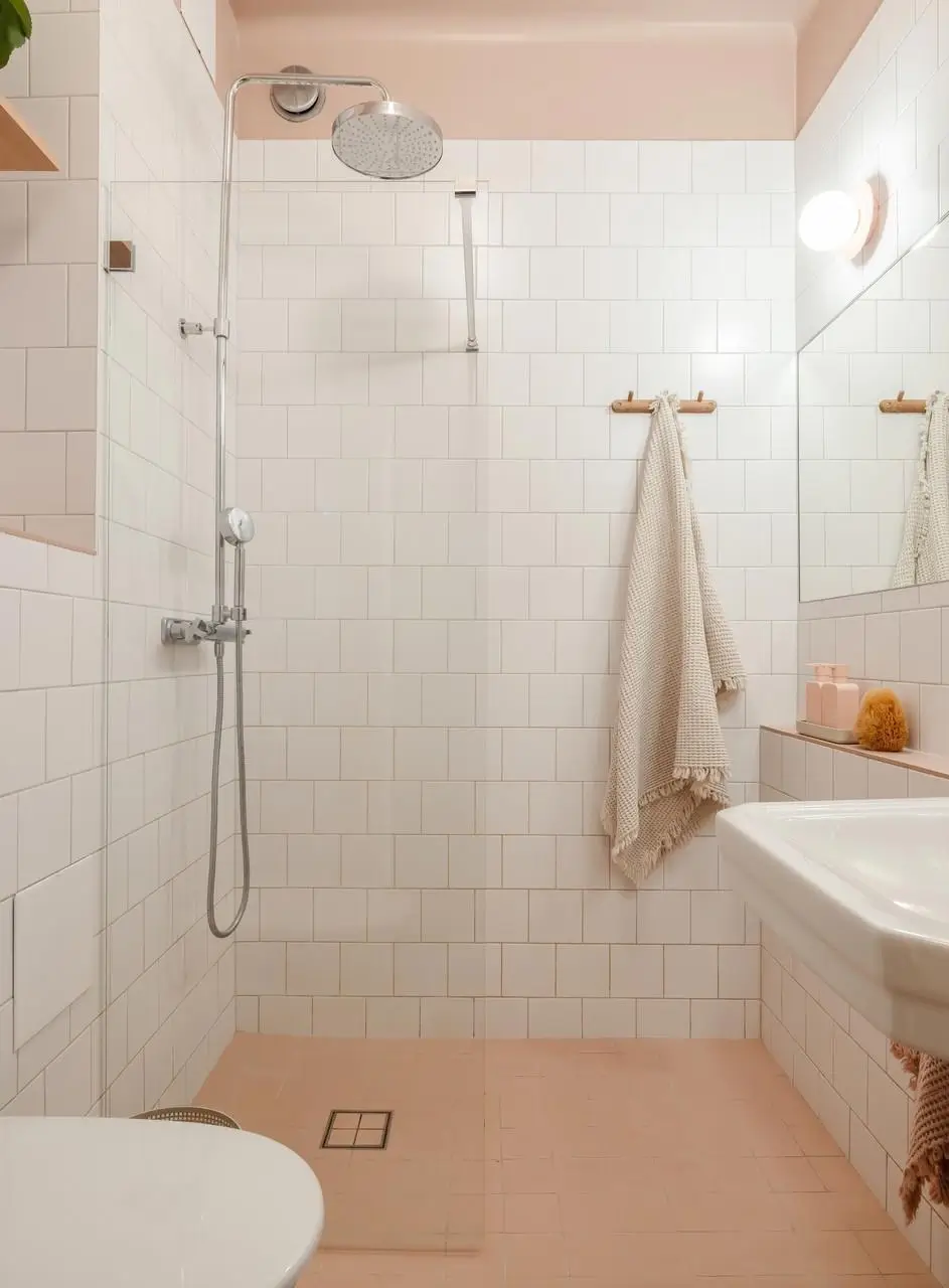 Colorful Rooms in a Practical Stockholm Family Apartment 18 pink and white bathroom