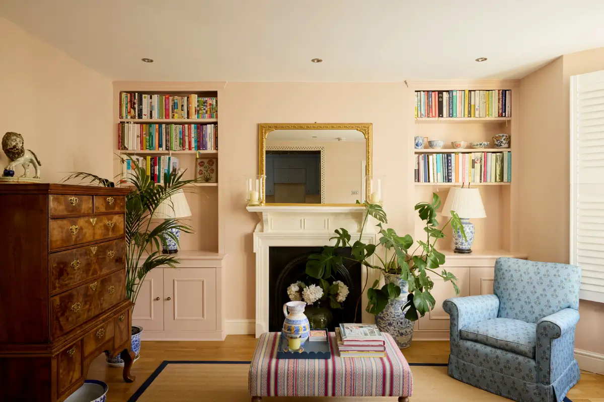 pink living room fireplace built-in shelves nordroom