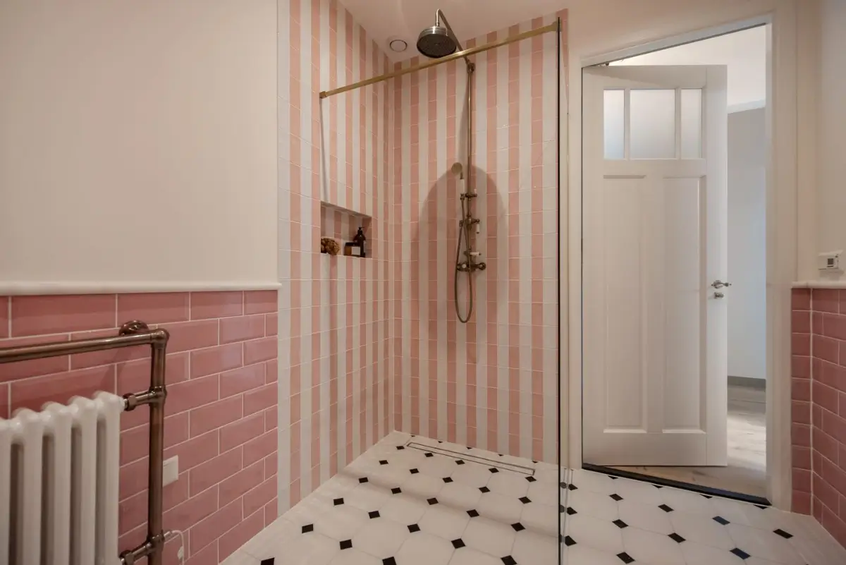Art Nouveau Elegance Meets Modern Living in a Pink & Green Apartment 23 pink striped shower tiles