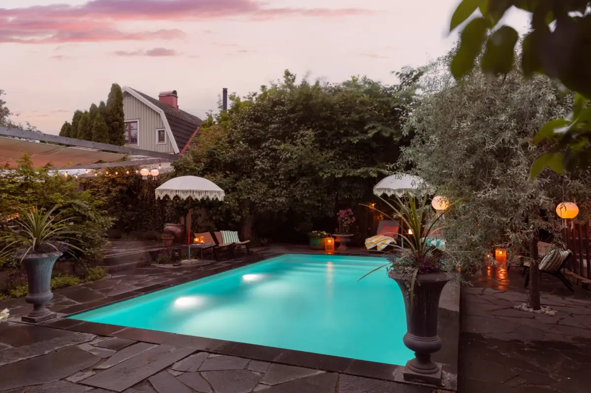 A Renovated 1920s Villa with a Spectacular Garden 41 pool at night