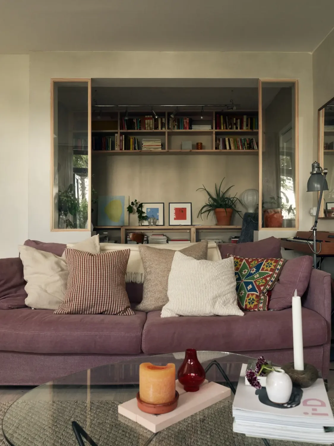 Industrial Elements in a 1960s Duplex Apartment in Stockholm 6 purple sofa