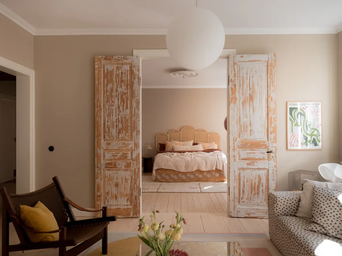 Neutral Shades and Period Elements in a Scandi Apartment 10 raw wooden doors