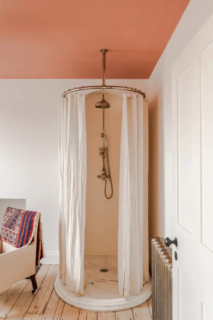 A Bright Late Victorian Townhouse in London 17 round shower terracotta-colored ceiling