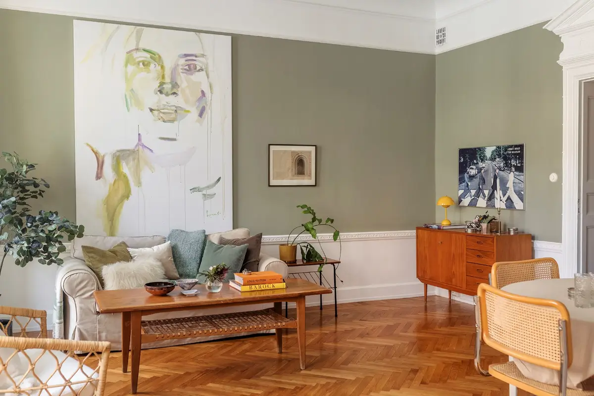 A Farrow & Ball Palette in an Art Nouveau Stockholm Apartment 2 sage green living room parquet flooring