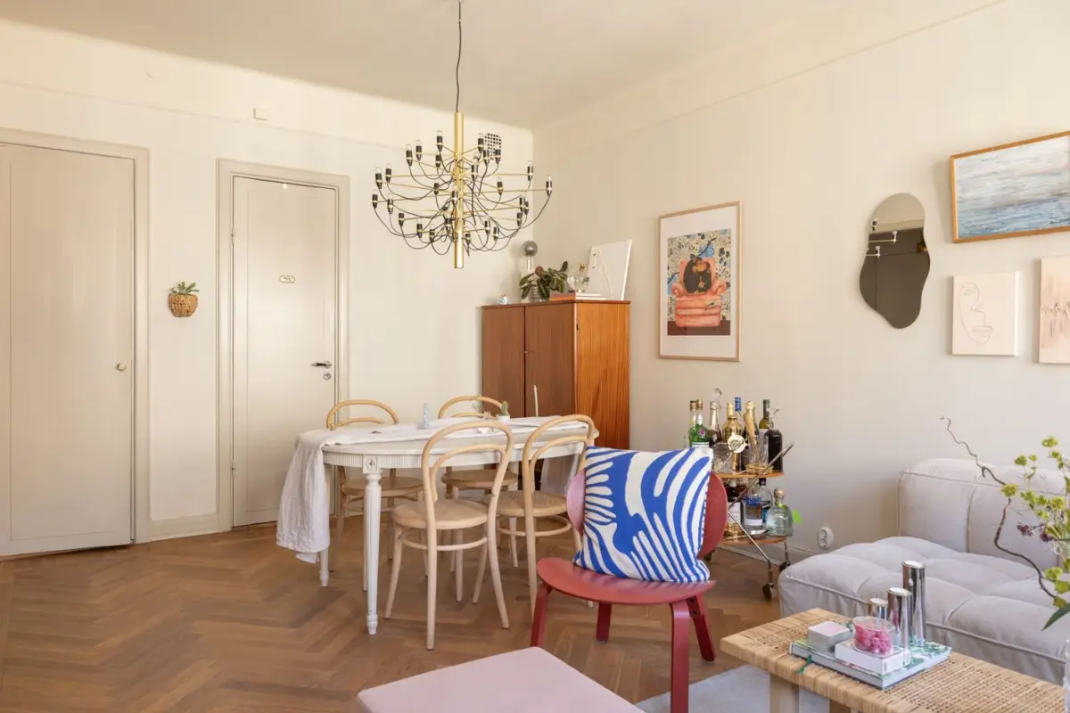 A Small Beige Stockholm Apartment with Plenty of Storage 5 scandi living room herringbone parquet floor