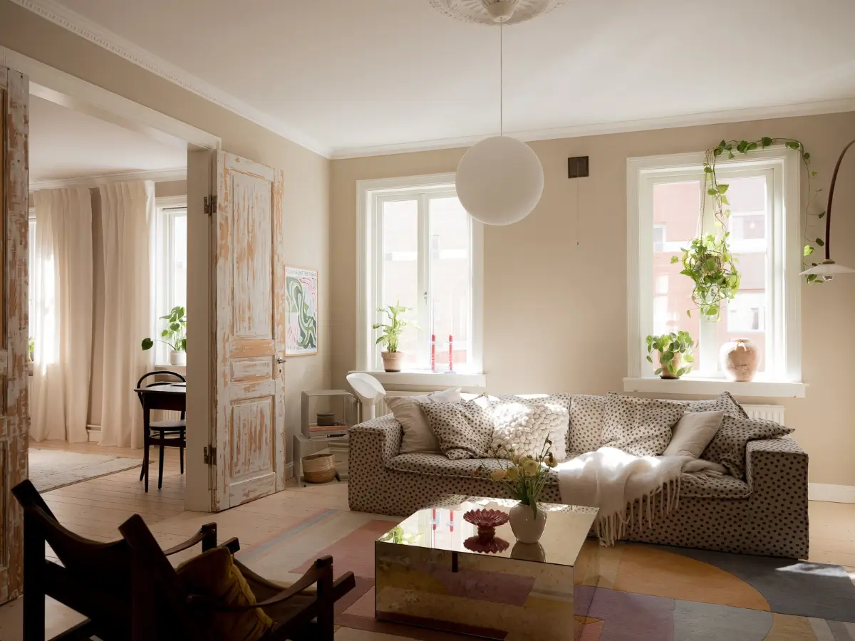 scandi living room sand-colored walls polkadot sofa