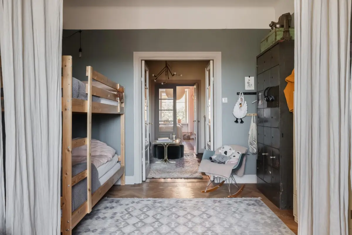 Colorful Rooms in a Practical Stockholm Family Apartment 17 shared kids bedroom dark blue walls