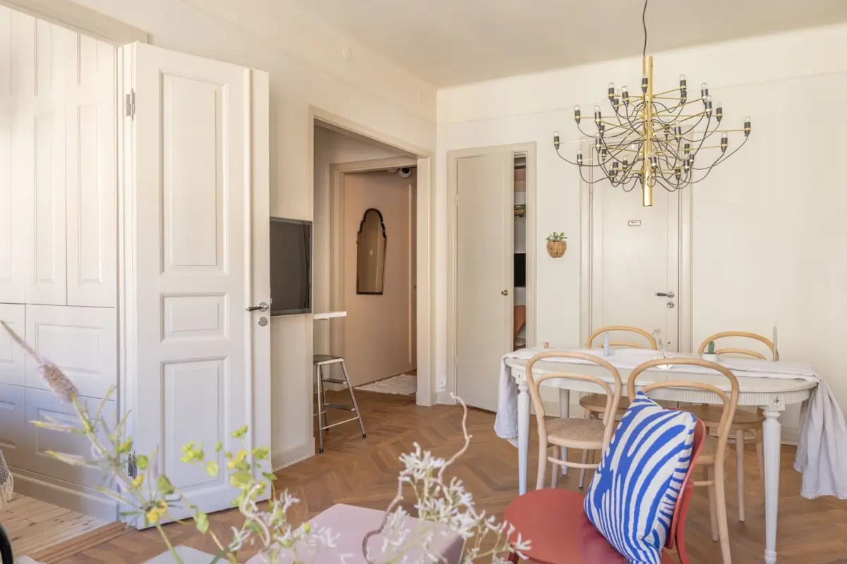 A Small Beige Stockholm Apartment with Plenty of Storage 10 small open-plan living room kitchen