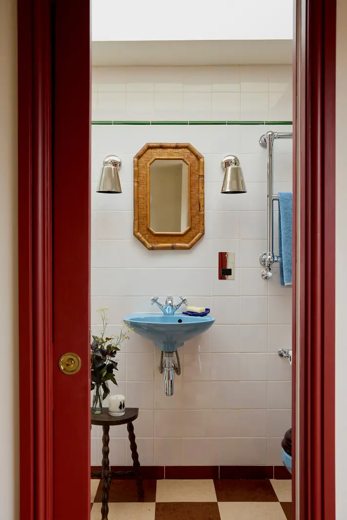 A Victorian Home with a Rich Color Palette and a Lush Garden 21 small red and blue bathroom