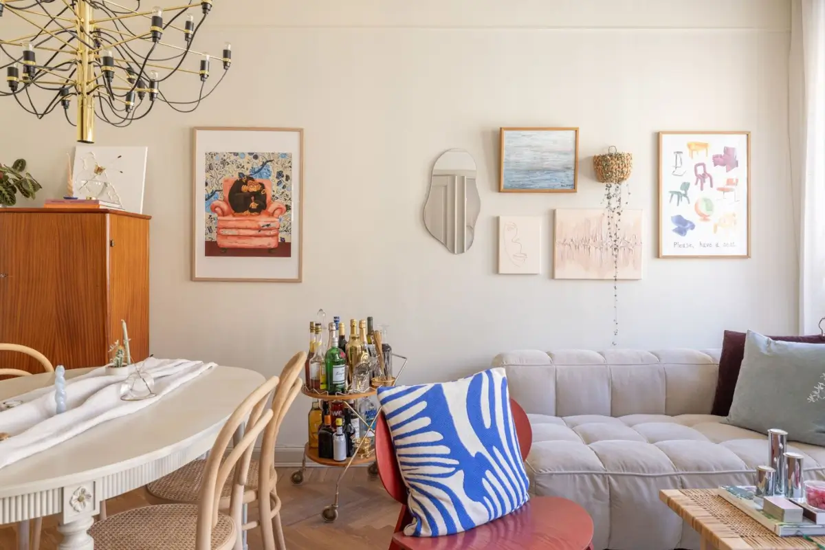 A Small Beige Stockholm Apartment with Plenty of Storage 4 small scandi living room round table