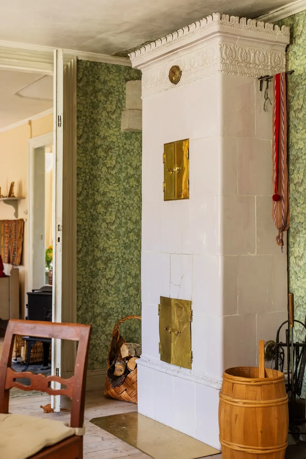 A Historic Lakeside Summer House in the Stockholm Archipelago 5 swedish fireplace