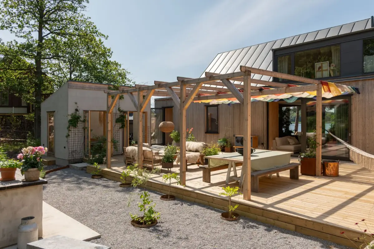 A Modern Wooden Cottage with Sea Views Close to Stockholm 32 terrace with pergola