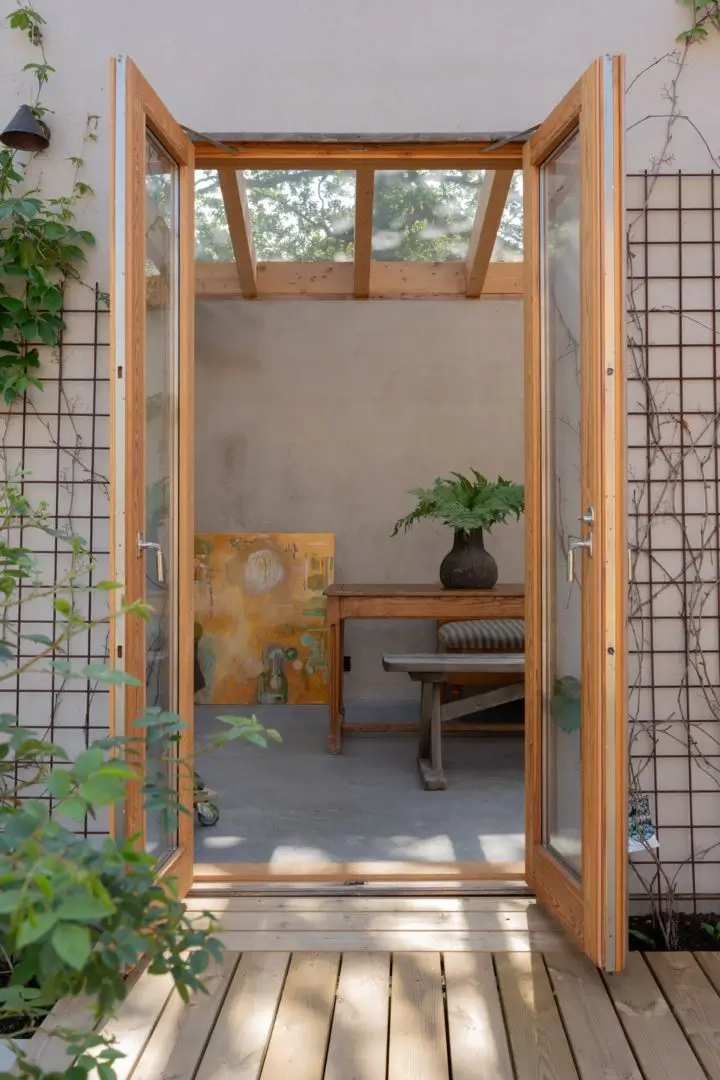 A Modern Wooden Cottage with Sea Views Close to Stockholm 35 view into garden house