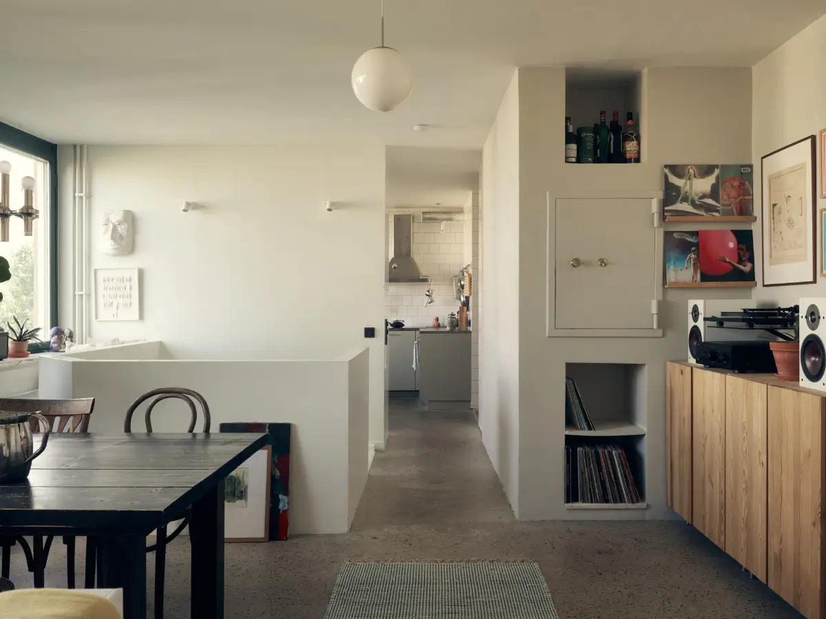 Industrial Elements in a 1960s Duplex Apartment in Stockholm 28 view into kitchen