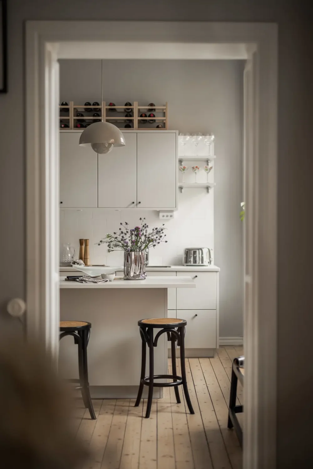 A Gray Scandinavian Apartment with a Royal History 9 view into kitchen