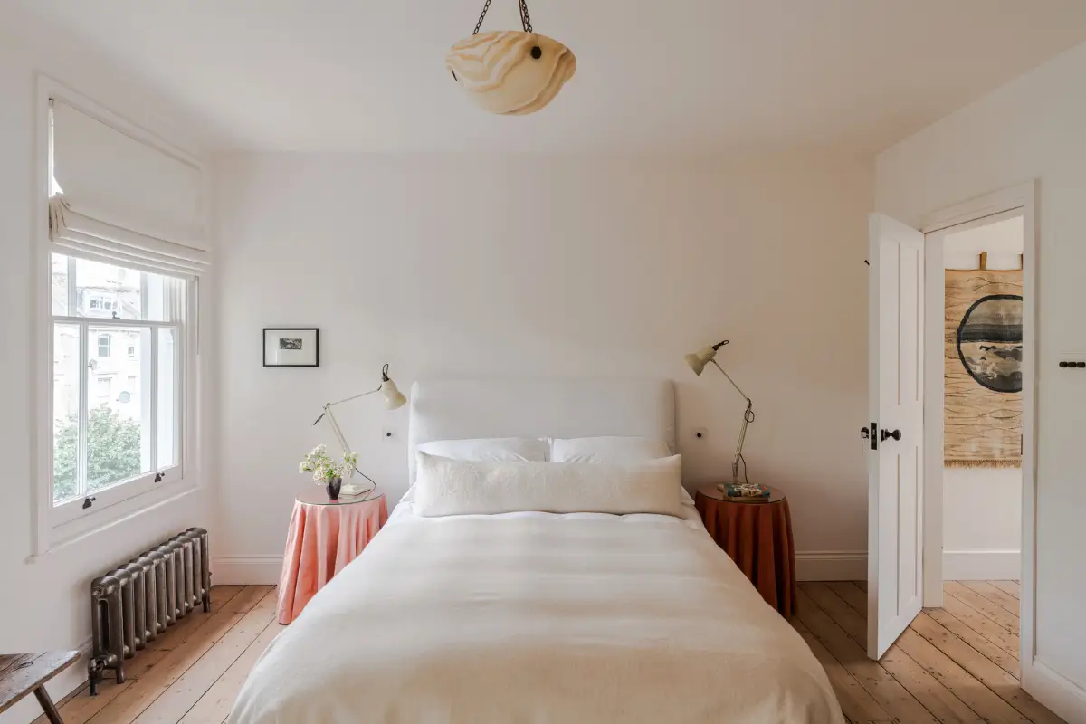 A Bright Late Victorian Townhouse in London 13 white bedroom wooden floo