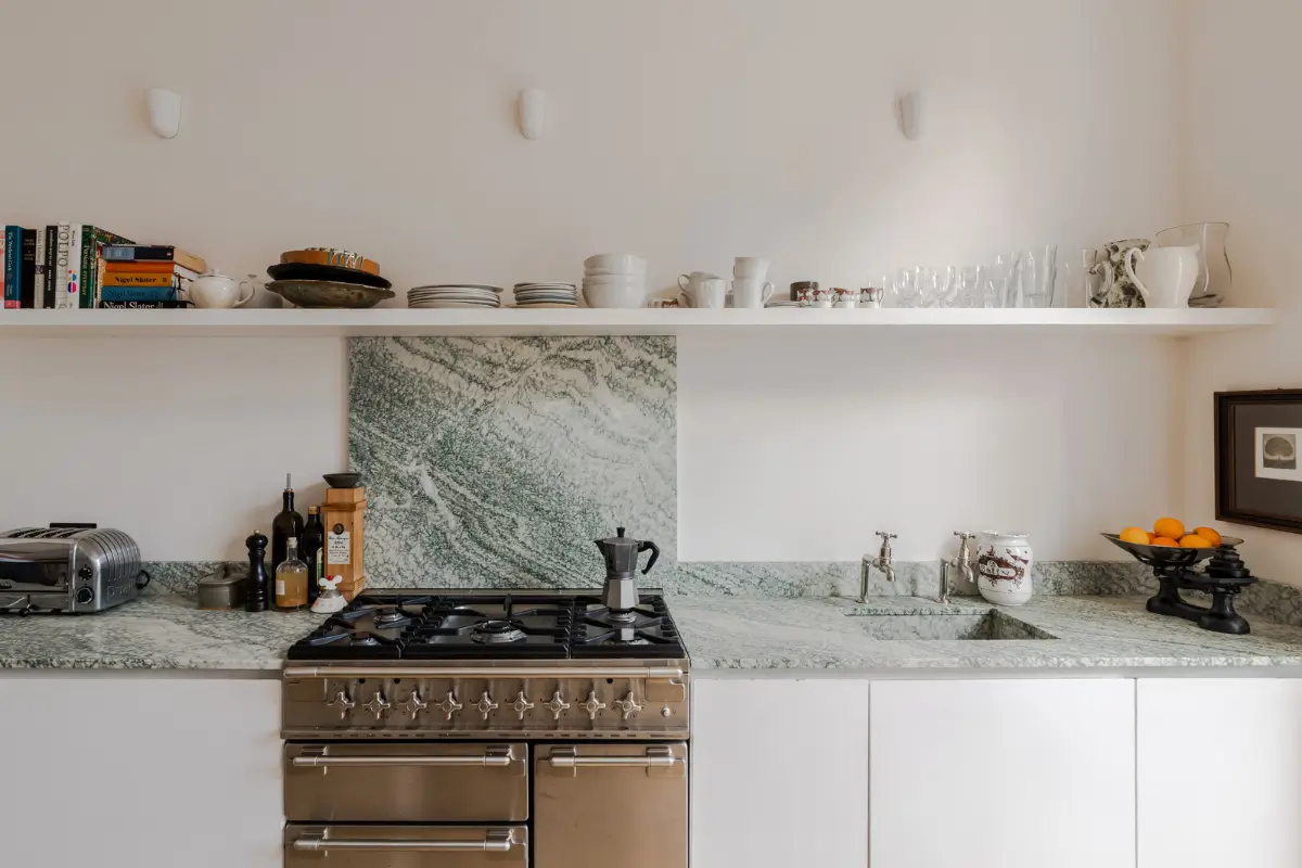 A Bright Late Victorian Townhouse in London 8 white kitchen with shelf