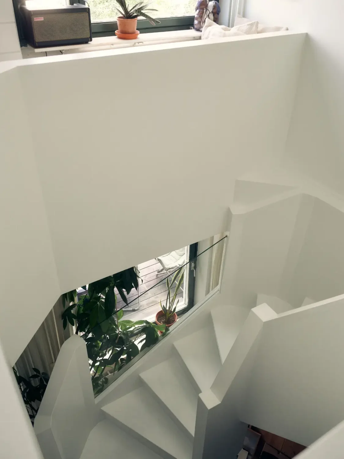 Industrial Elements in a 1960s Duplex Apartment in Stockholm 20 white staircse nordroom