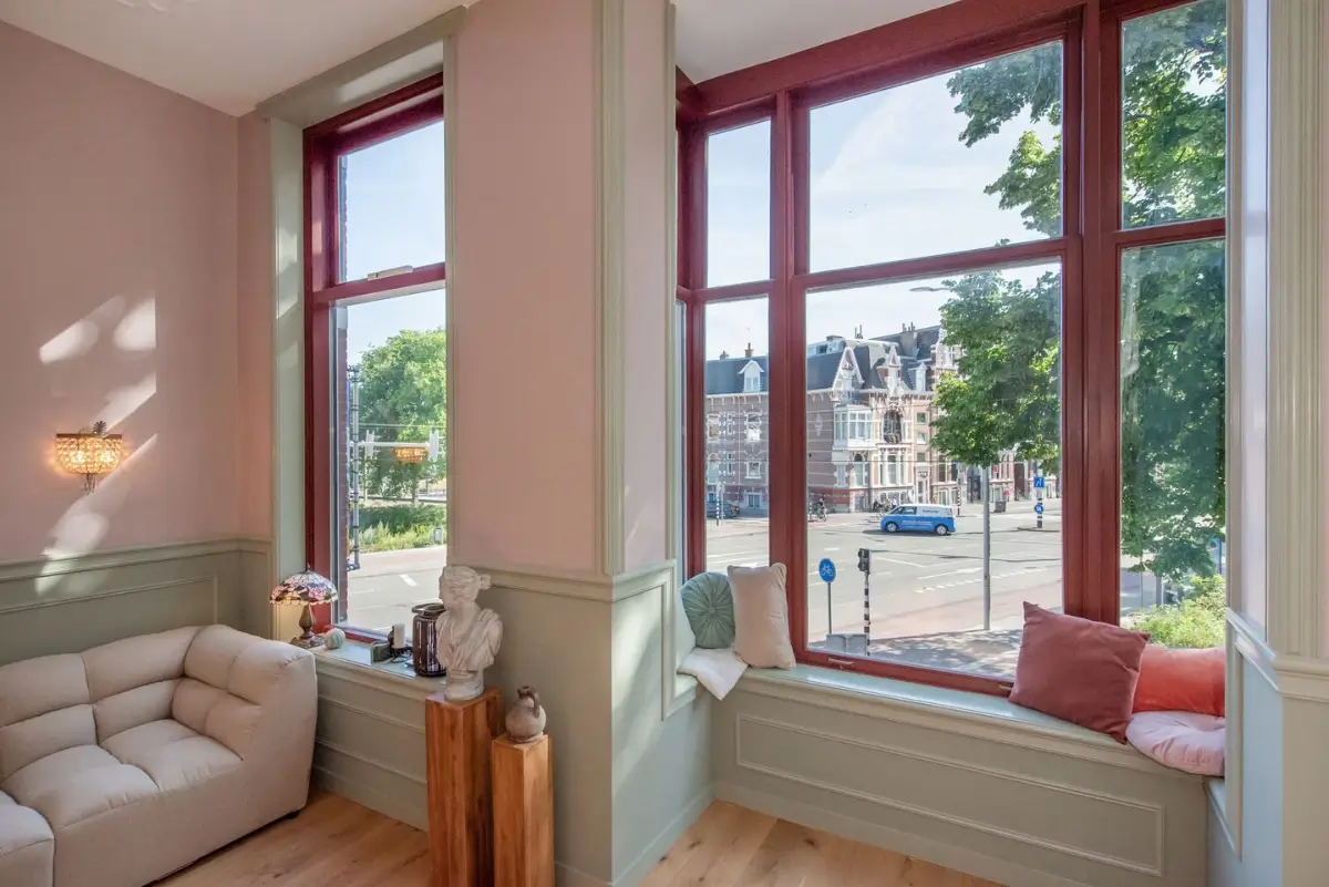 Art Nouveau Elegance Meets Modern Living in a Pink & Green Apartment 8 window seat