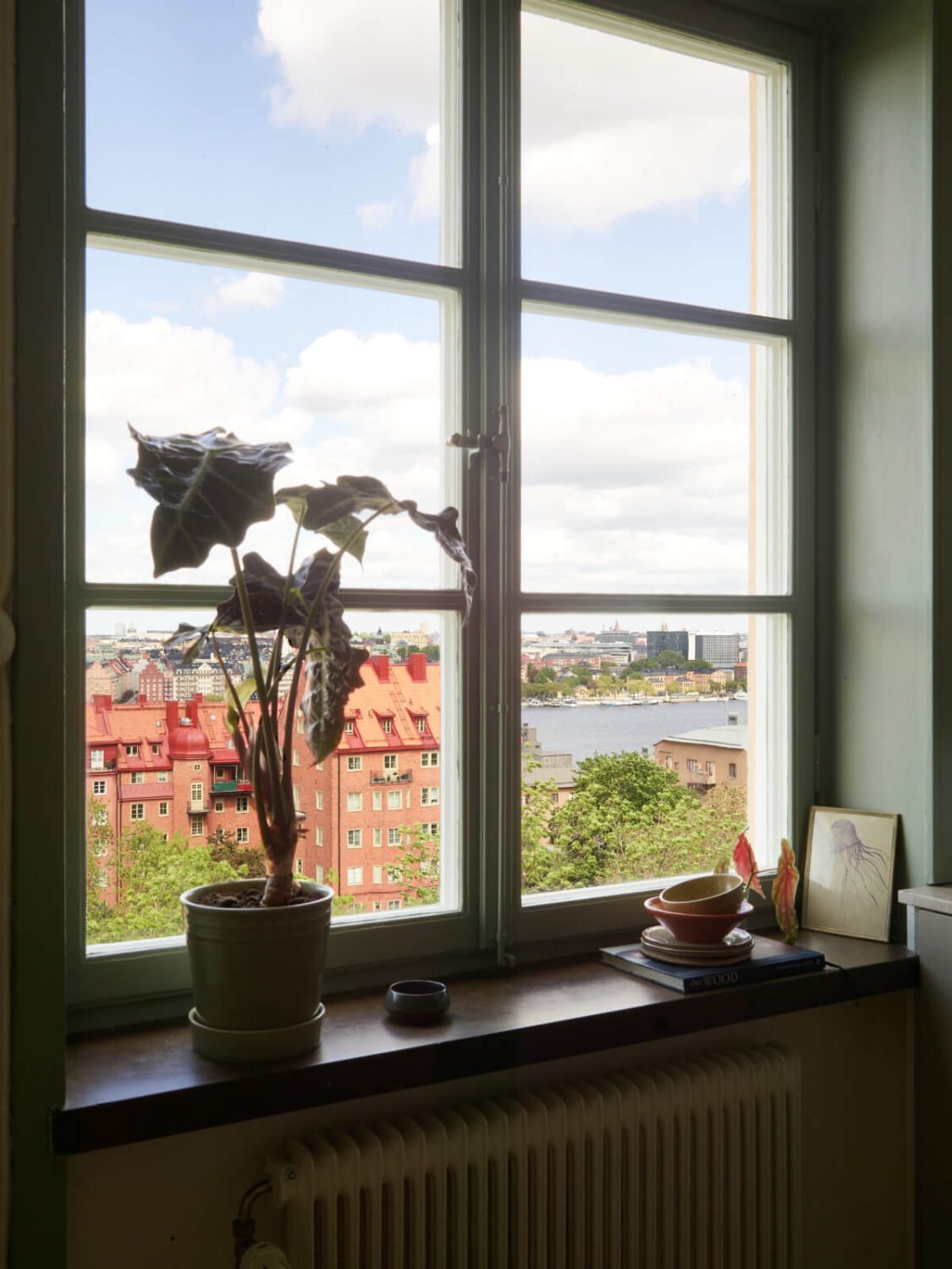 A Stockholm Apartment with a Butter-Yellow Bedroom 5 window view