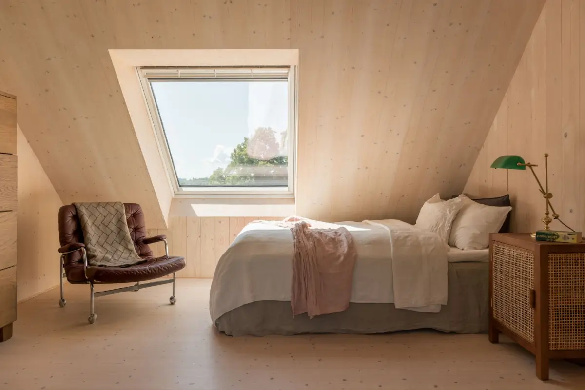 A Modern Wooden Cottage with Sea Views Close to Stockholm 19 wooden bedroom large window