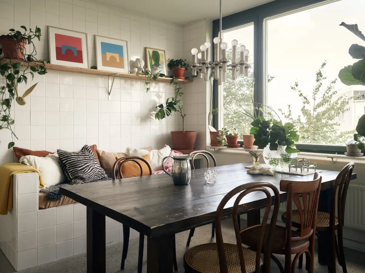 Industrial Elements in a 1960s Duplex Apartment in Stockholm 25 wooden dining table tiled built-in bench nordroom