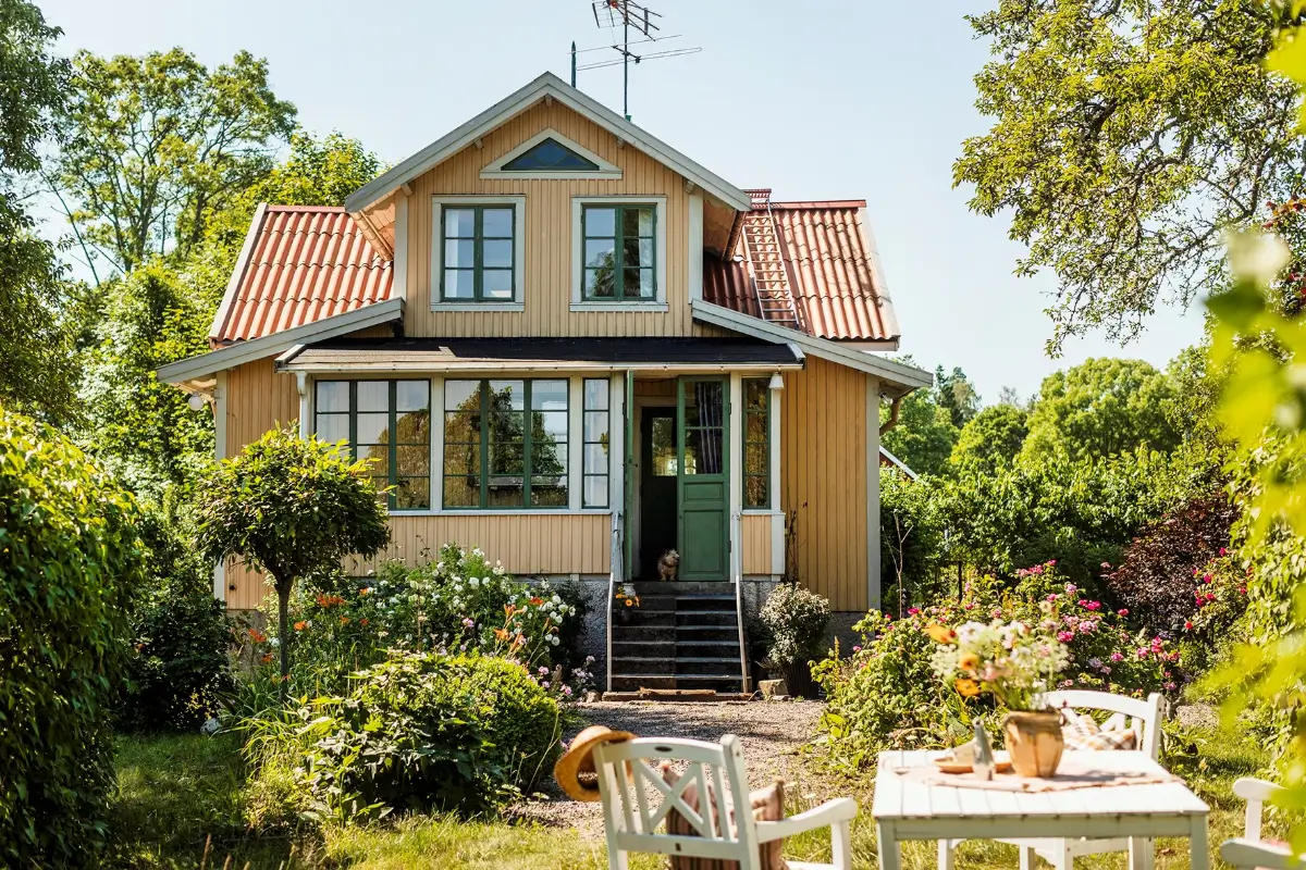 Best of 2025: Architecture 9 yellow swedish country house lush garden