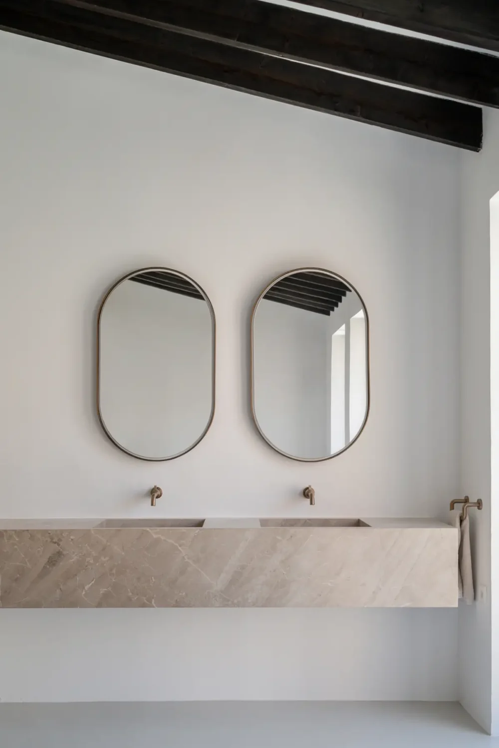 A 19th-Century Mallorcan Townhouse Restored by &TEMPEL 18 Palazzo-Bartomeu-double-sink-wooden-beams-nordroom