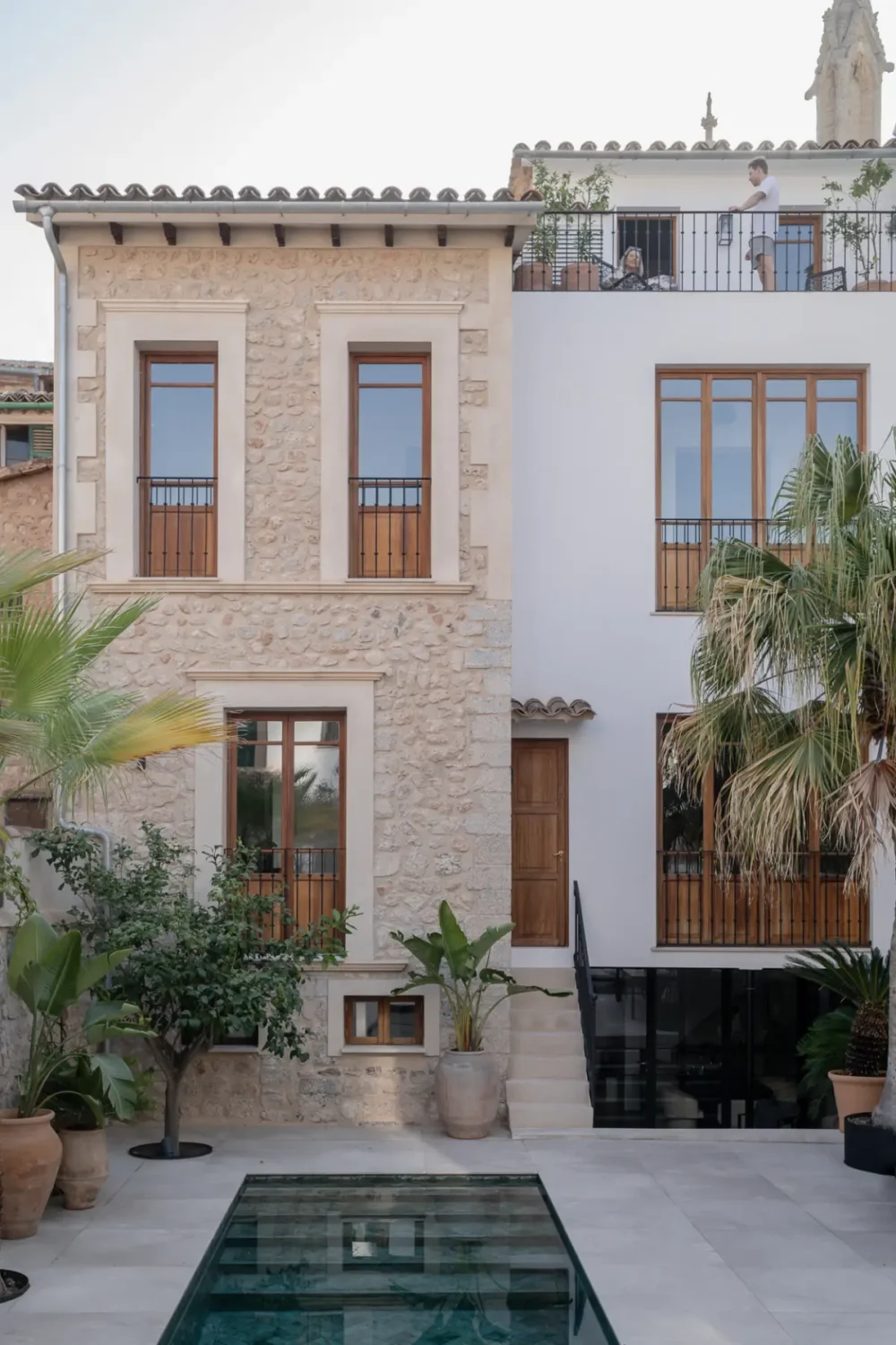 A 19th-Century Mallorcan Townhouse Restored by &TEMPEL 19 Palazzo-Bartomeu-exterior-garden-nordroom