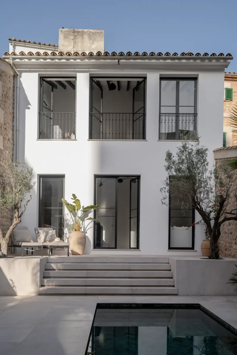 A 19th-Century Mallorcan Townhouse Restored by &TEMPEL 16 Palazzo-Bartomeu-modern-garden-pool-nordroom