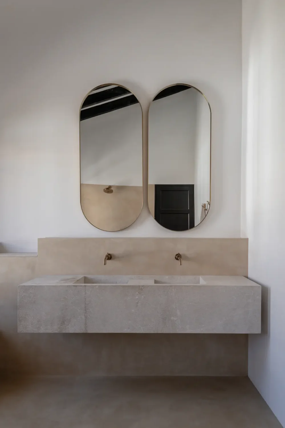 A 19th-Century Mallorcan Townhouse Restored by &TEMPEL 14 Palazzo-Bartomeu-sleek-double-bathroom-sink-nordroom
